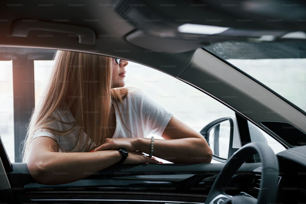 Side profile of vehicle showing uniform tint shade across windows