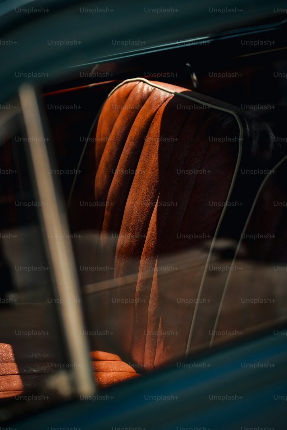 Sleek luxury vehicle with dark tinted windows and clean profile
